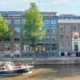 Gerenoveerd Gouden Bocht-complex aan de Herengracht in Amsterdam, getransformeerd tot modern en duurzaam multi-tenant kantoorgebouw met advies van EWZ Adviseurs.